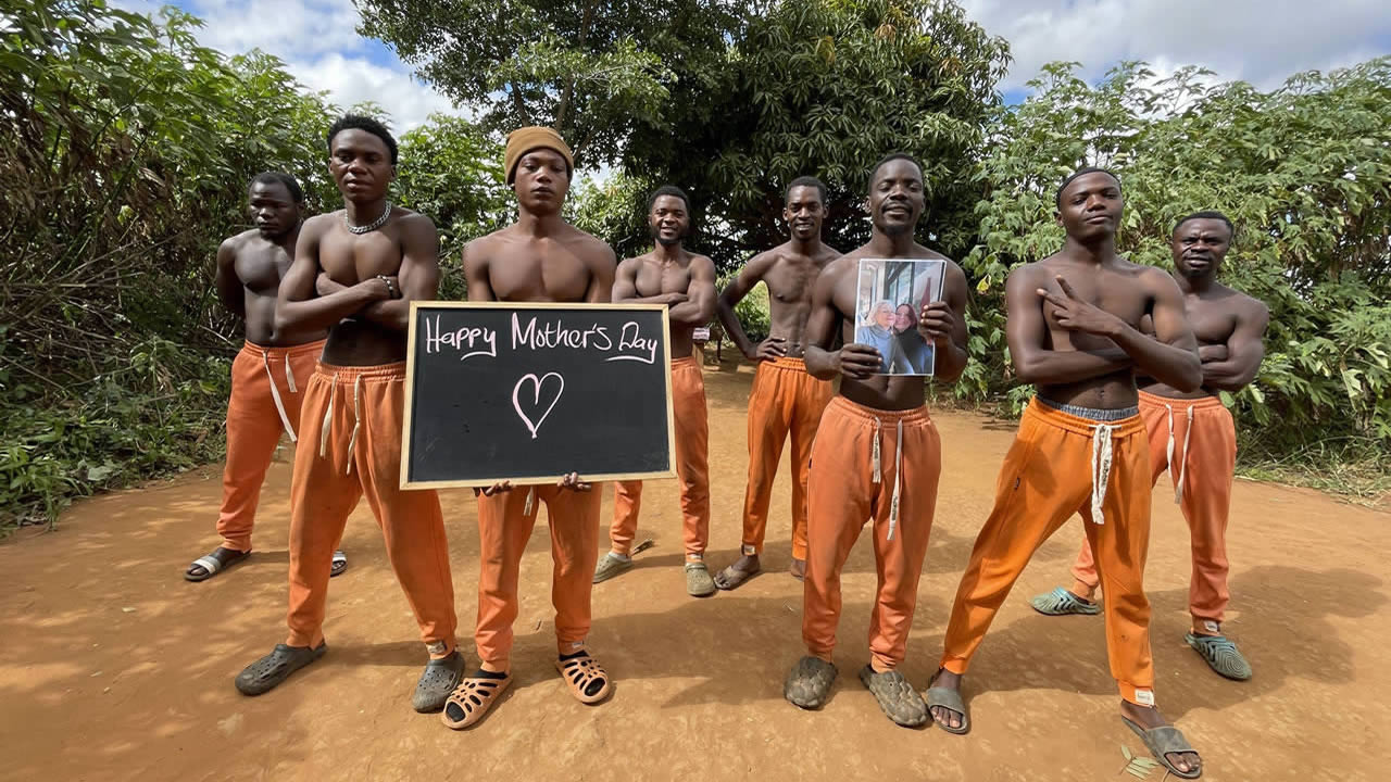 African Orange Pants Team