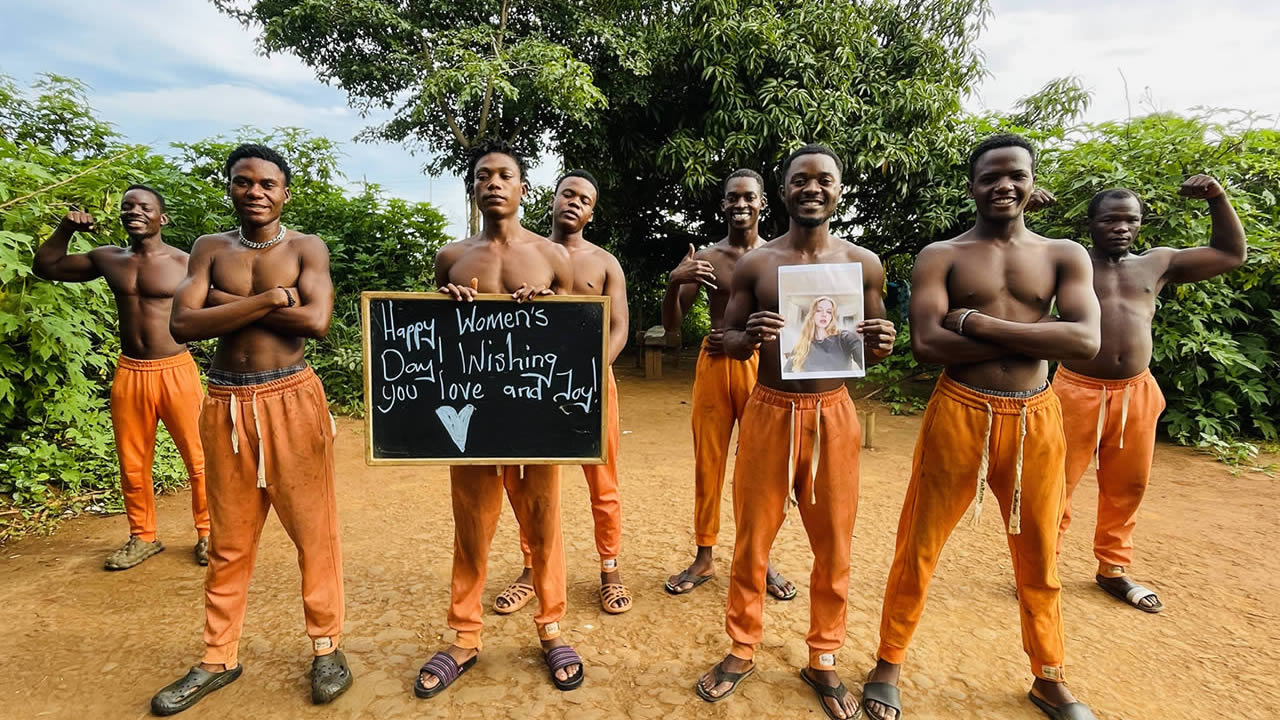 African Orange Pants Team
