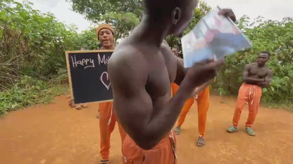African Orange Pants Team
