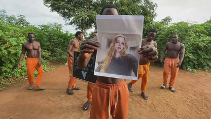 African Orange Pants Team